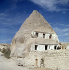 Turkey, Cappadocia, modern cone dwelling house carved out of Tufa caused by lava from the now extinct volcano Mount Erciyes